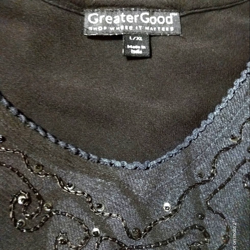 Greater Good black sequin tunic with butterflies and polka dots.